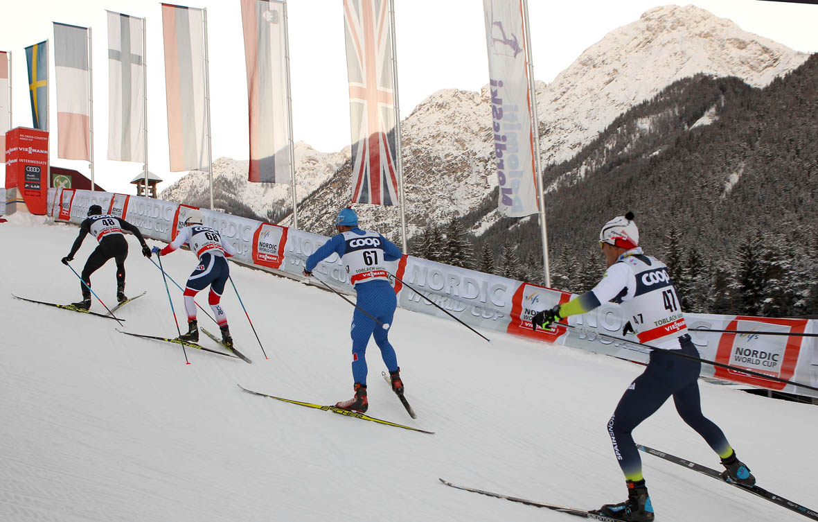 NORDIC ARENA, MERAVIGLIA INNEVATA. TOUR DE SKI A DOBBIACO: SI PARTE!