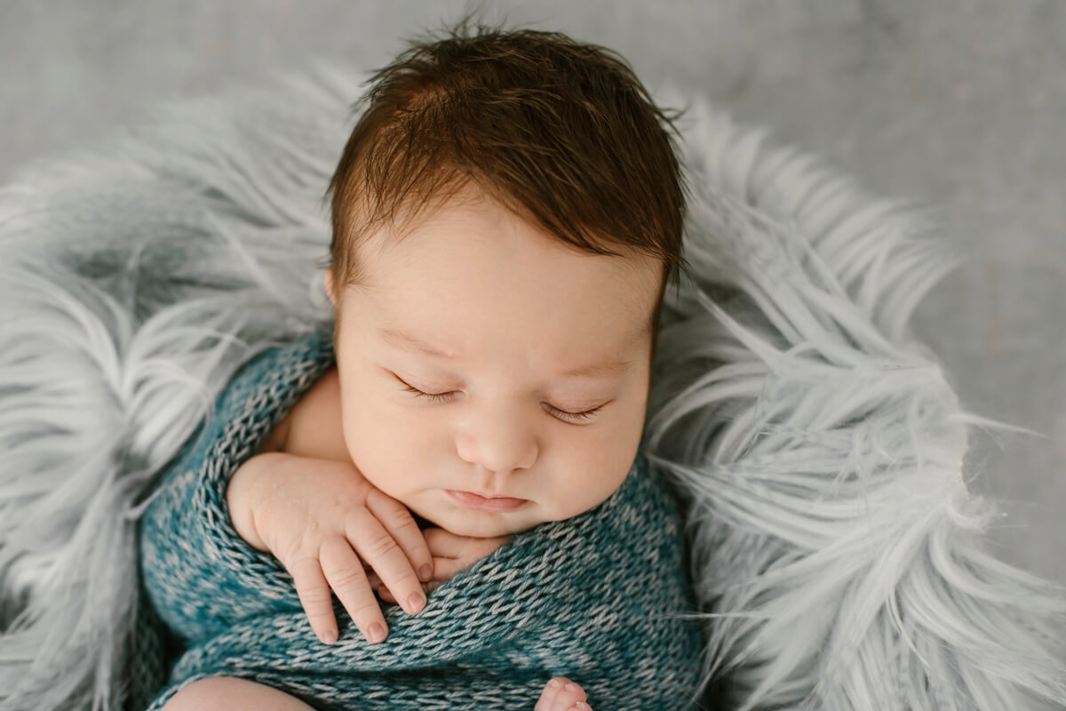 5 motivi da considerare nell'assumere un fotografo newborn professionista