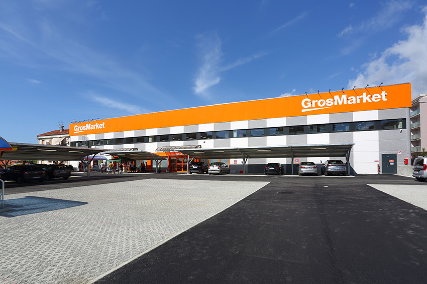 Take cura il cambio di marchio da Sogegross Cash & Carry a GrosMarket 